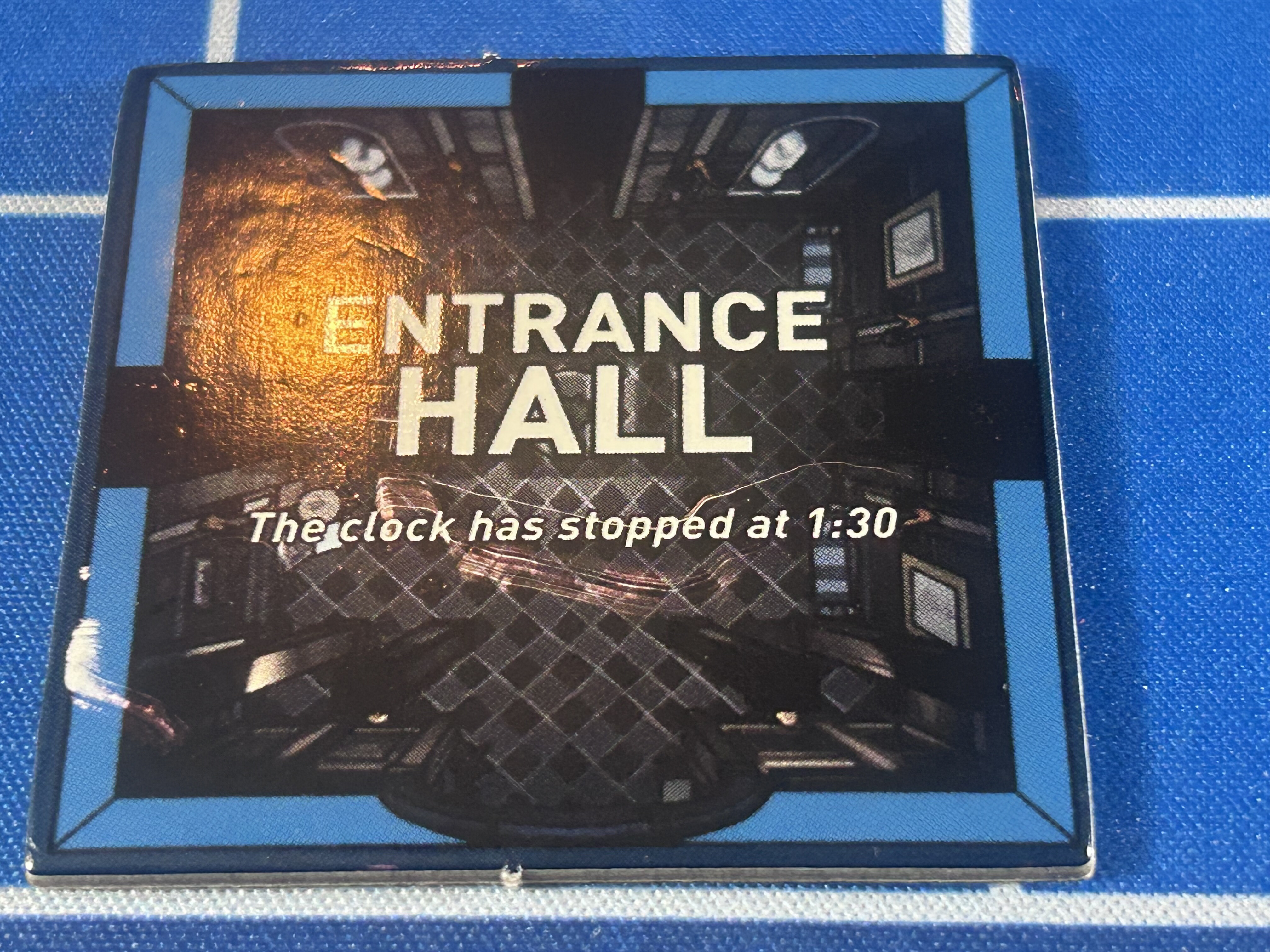The Entrance Hall tile, showing a warmly lit hallway and the text: the clock has stopped at 1:30